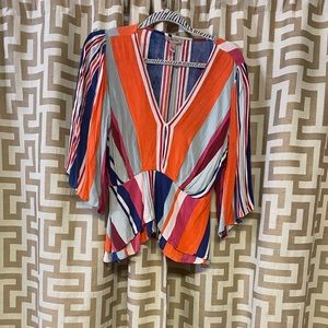Colorful quarter length sleeve shirt.